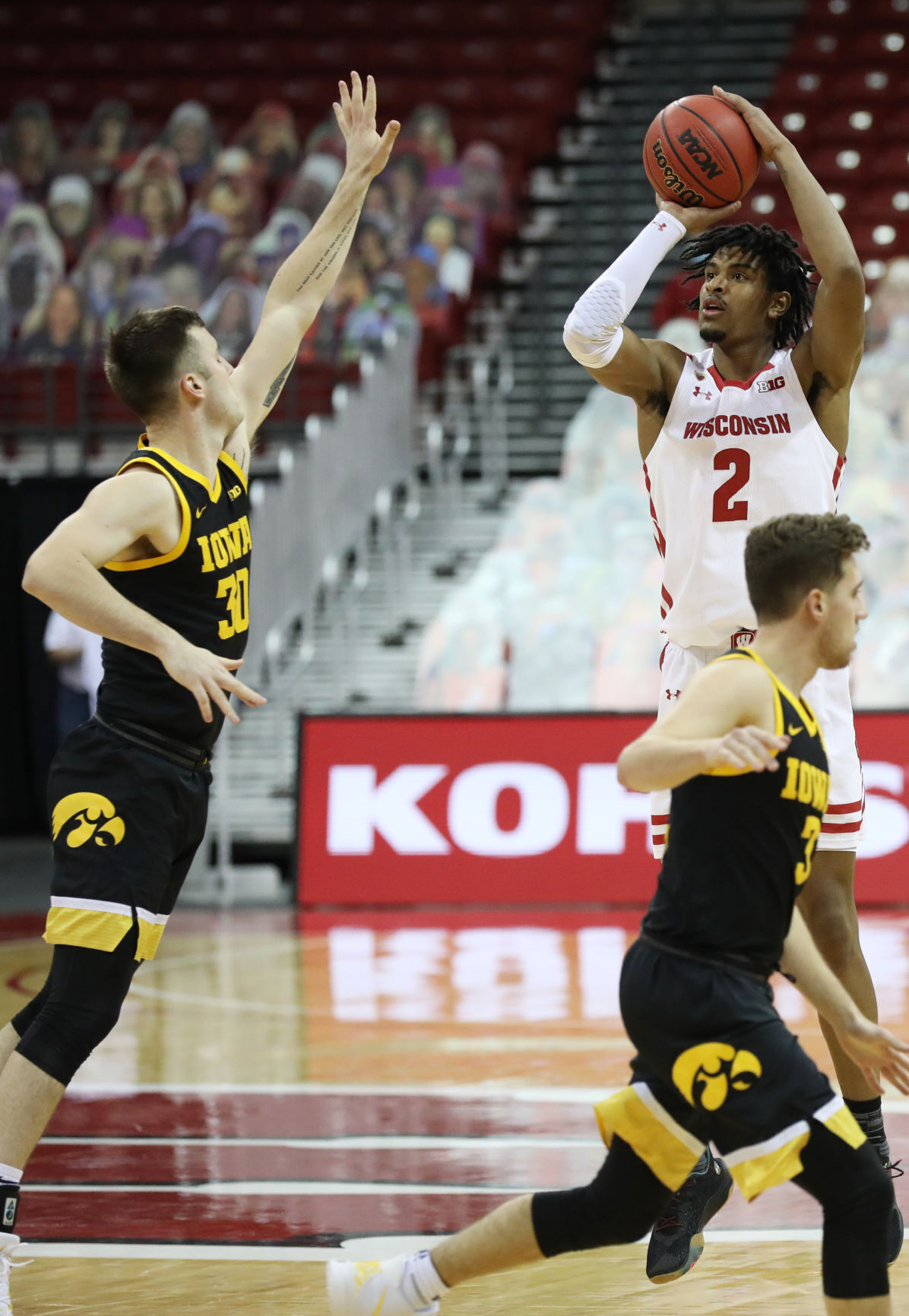 Iowa 77, UW 62